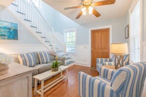 Cozy living room space with plenty of natural lighting