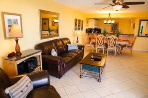 view from love seat through to dining area