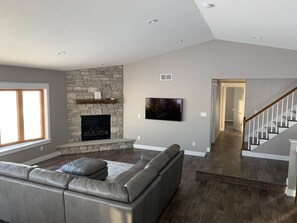 Gas fireplace in great room and 55" smart tv.