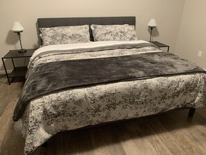 King size bed in master bedroom on main floor.  It has a master bathroom.