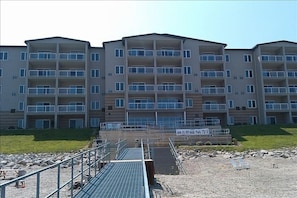 A view back from fishing pier.. Suite #402 is on the TOP floor all the way West.