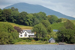 View of house from Loch Awe with the mighty Ben Cruachan in the background