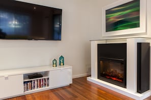 Electric fireplace and large screen TV