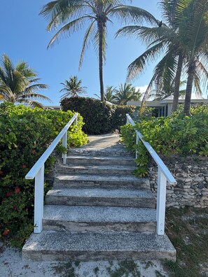 The stairs leading up to the bungalow from the parking area.
