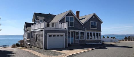 The house is directly across the street from the ocean