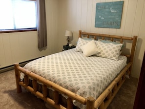 Upstairs bedroom with king bed and vaulted ceilings. Ready for a relaxing nap? 