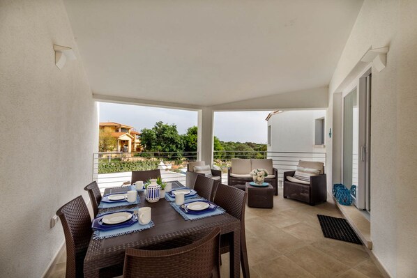 veranda with pool view