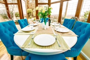 Beautiful Conservatory dining over looking countryside 
.