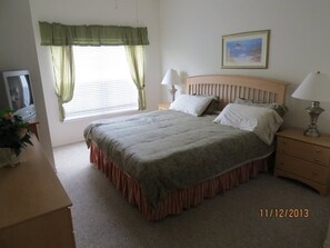 Main floor king bedroom with full ensuite bath