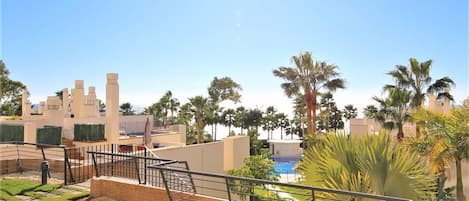 Fantastic views from your private terrace to the gardens, pool and sea