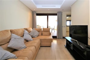 Beautiful and bright lounge area with quality seating and international TV channels