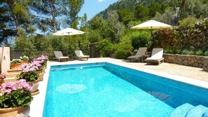 Heated swimming pool with views of the mountains and sea