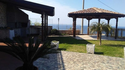 House with garden, gazebo, barbecue, pizza oven, and a view of Isola Cirella
