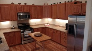 Beautiful Stainless and Granite Kitchen.