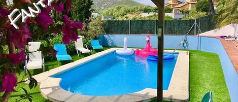 Our fantastic pool with superb mountain views.