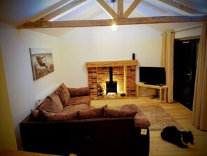 Living room with wood burner for those cosy winter evenings 