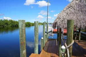 Large dock for lounging. Step-down  access to kayaks