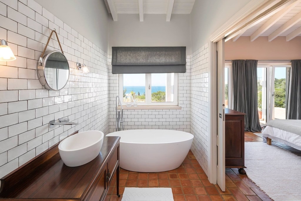 Freestanding bathtub in the room of a holiday villa in Algarve