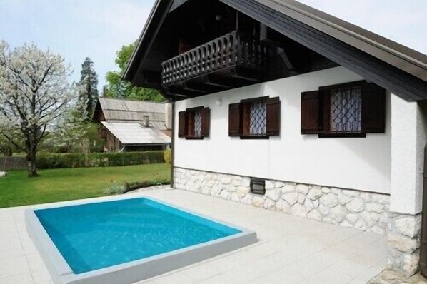 Private pool and sun-beds with umbrellas available