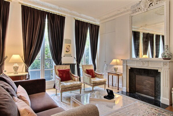 Cosy living room with an old chimney 