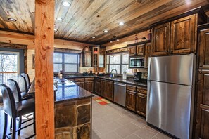 Kitchen with Granite Counters and Stainless Steel Appliances