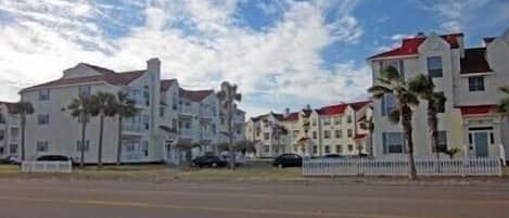 View of Beach Club Condominiums.  Condo located in building on left.