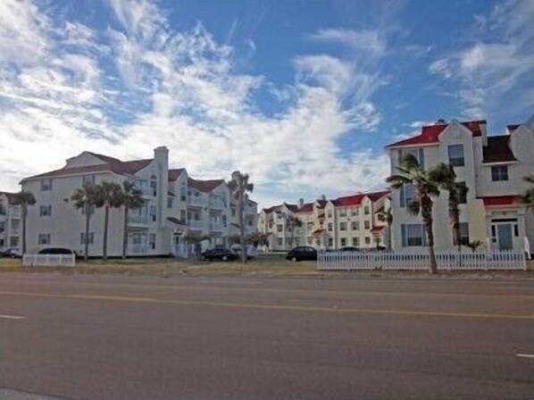 View of Beach Club Condominiums.  Condo located in building on left.