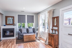 When the ocean breezes turn cool, retreat to a warm corner in the living room.