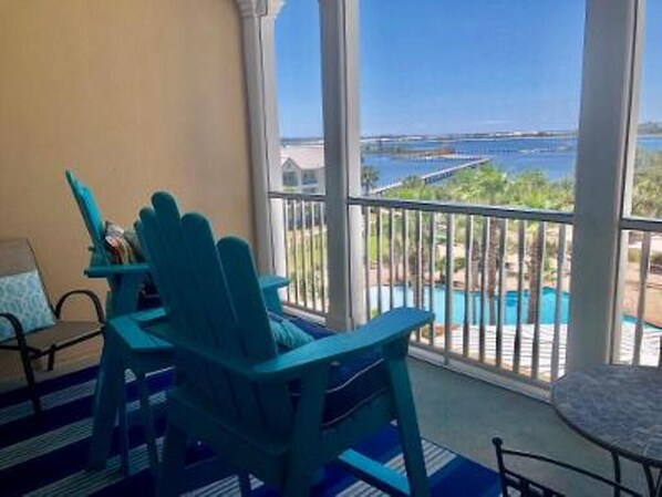 Balcony with a view, tv and seating for six