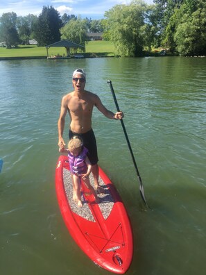 Our paddleboard and oldest son and oldest granddaughter.