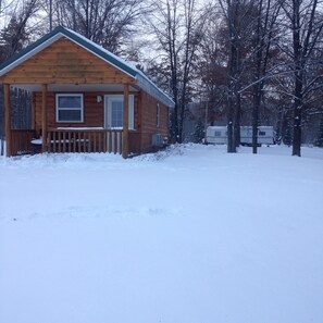 Cabin #1 Background 33' Stationary Travel Trailer