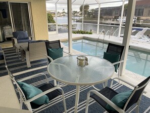 Pool and canal-side dining.
