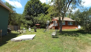 view of cabin with other rental house at left