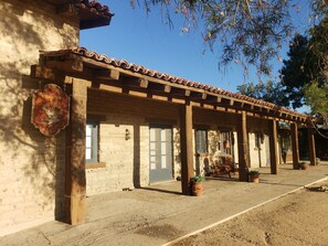 The Main House porch. The adobe bricks were handmade on the ranch.
