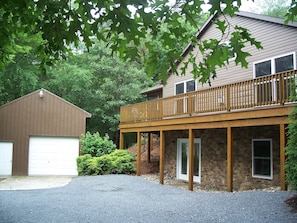 Drive in toward the garage and house.
Wrap around deck, screen in porch