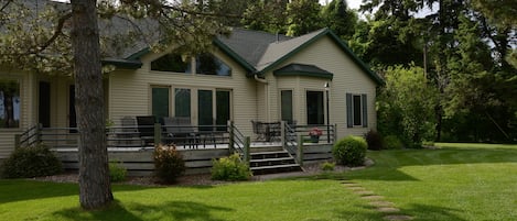 The view from the lake edge of the home which is yours for your lake getaway.  