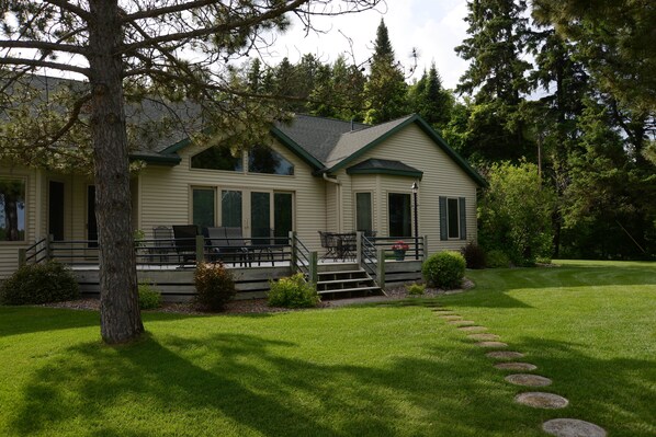 The view from the lake edge of the home which is yours for your lake getaway.  