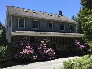 Our home with front porch for you to enjoy. Deck in back.