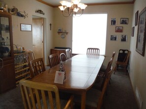 Formal Dining Room has 9-foot table with comfortable seating for 10 (can add 4)