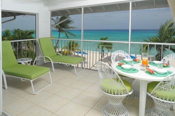 The terrace with expansive beach and sea view south towards Georgetown