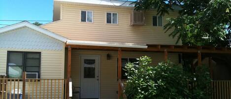 The Carriage House has a private deck and a private parking space. 