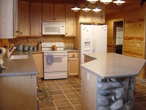 Large spacious kitchen with island bar