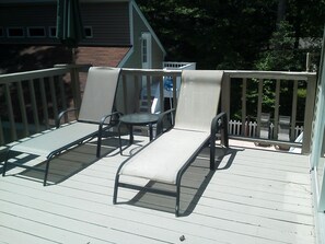 Upper deck off the loft bedroom, pool is beside the Garage 