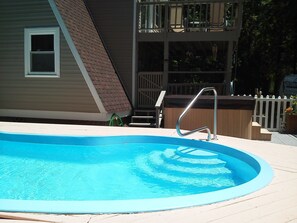 Hot Tub Beside Pool