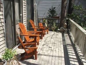 Front Deck Offers Plenty Of Shade and Sun and comfortable cedar chairs