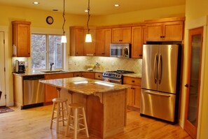 Kitchen - 2nd story -- well stocked with pans, utensils and appliances