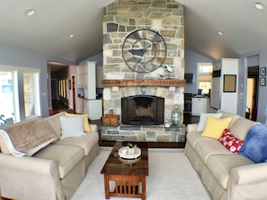 Open floor plan and large fireplace in main living area