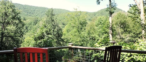 Two rocking chairs facing Yellow Creek Mountains.