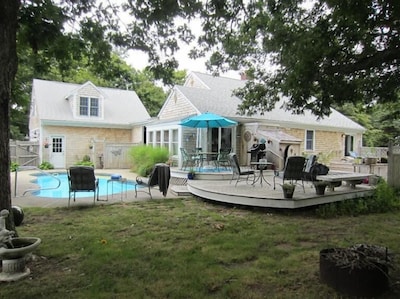 Delightful 5-bedroom cottage  with pool, decks, great yard, 1/2 mile from ocean!