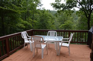 back deck with table and chairs
